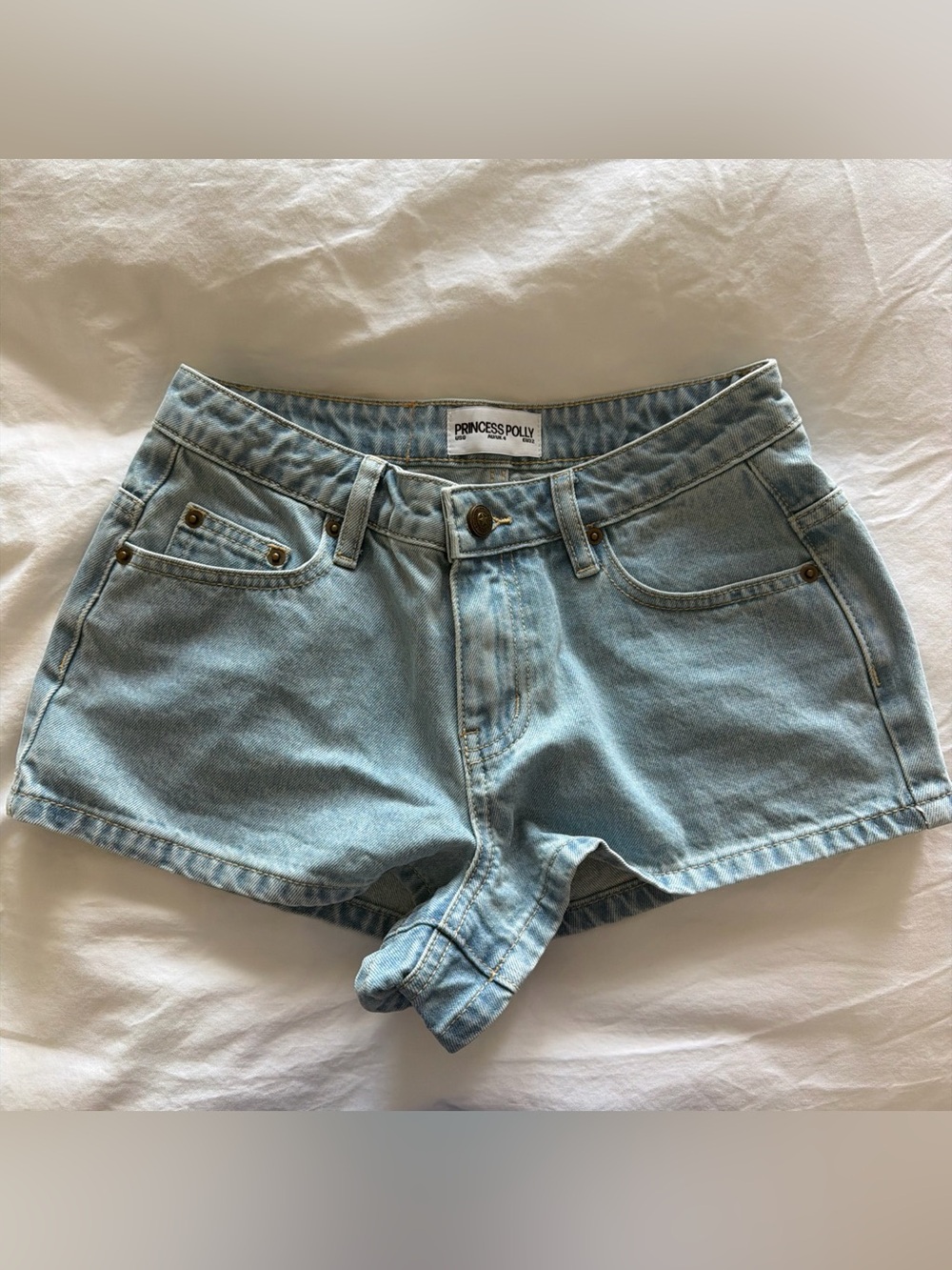 Princess Polly Light Wash Denim Low Waisted Shorts